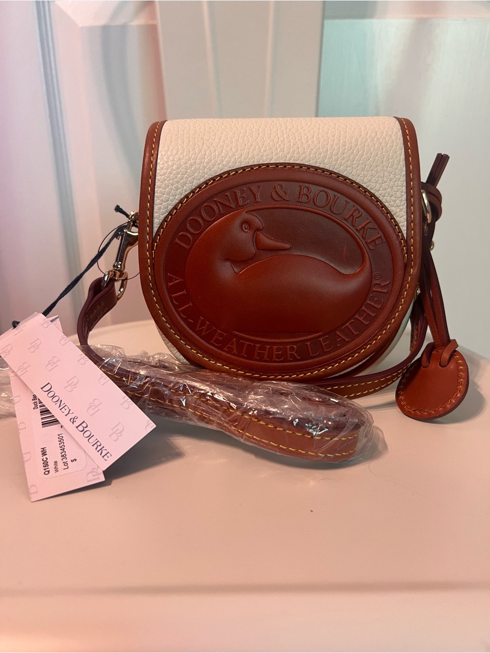 NWT Dooney & Bourke Ivory and Brown Leather Logo Crossbody